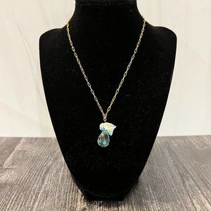 Gold tone pendant necklace